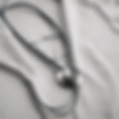 Elegant stethoscope resting on a pristine white coat