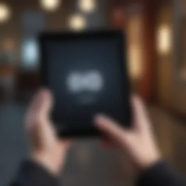 Hand holding iPad with Discount Sign